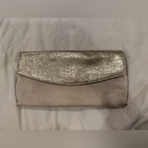 Small tan clutch